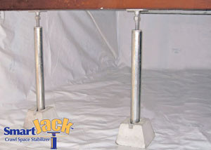 Crawl space structural support jacks installed in Bourget