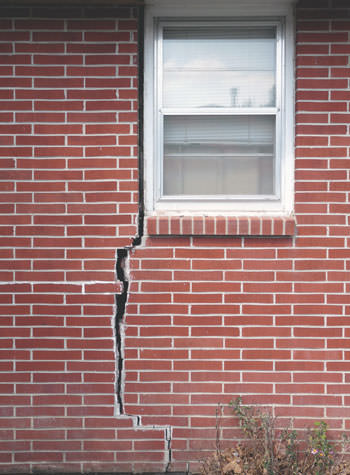 severe foundation wall cracks along a window in Maxville