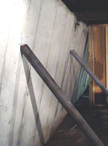 A foundation wall leaning in at the top in Munster