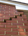 Serious damage to a foundation wall due to settlement of a home in Elizabethtown