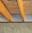 SilverGlo™ insulation installed in a floor joist in Arnprior