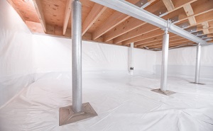 Crawl space structural support jacks installed in Bourget
