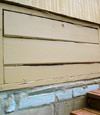 an old-fashioned crawl space door in Russell about to be replaced