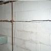 Severe foundation damage from a long crack in a bucking wall of a Rockland home.