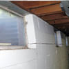 A foundation showing severe inward buckling along the windows in a Rockcliffe home.