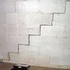 A diagonal stair step crack along the foundation wall of a Manotick home