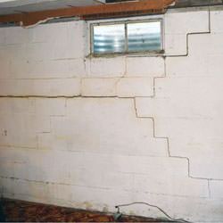Bowing foundation walls in danger of failure in Bourget