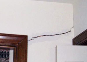 A large drywall crack in an interior wall in Kanata