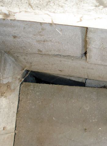inward rotation of a foundation wall damaged by street creep in a garage in Maxville