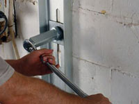 Mounting a foundation wall channel anchor in Smiths Falls.