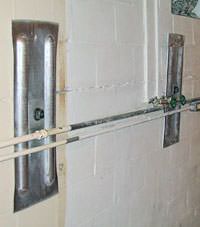 A foundation wall anchor system used to repair a basement wall in Embrun
