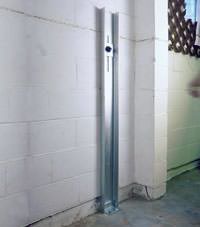 A failing foundation wall repaired with a foundation wall channel anchor system in a Brockville home.