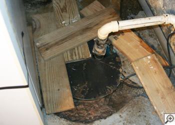 An ugly, clogged sump pump system in Smiths Falls, Ontario