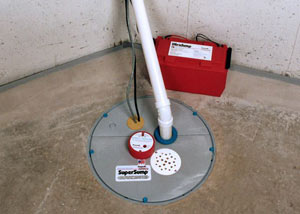 A sump pump system with a battery backup system installed in Embrun