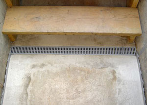Our grated drain system installed on a leaking basement staircase in Sarsfield.