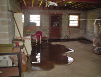 a flooded basement floor in a Edwards home