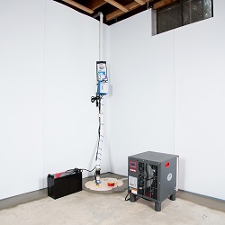 Sump pump system, dehumidifier, and basement wall panels installed during a sump pump installation in Rockland