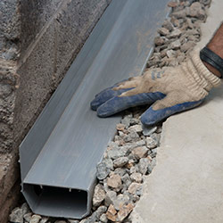 installing a drain tile system in a Embrun home